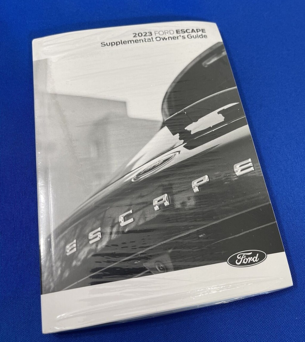 Picture of: Ford Escape Owners Manual NEW SEALED OEM Supplement Guide Factory  Original