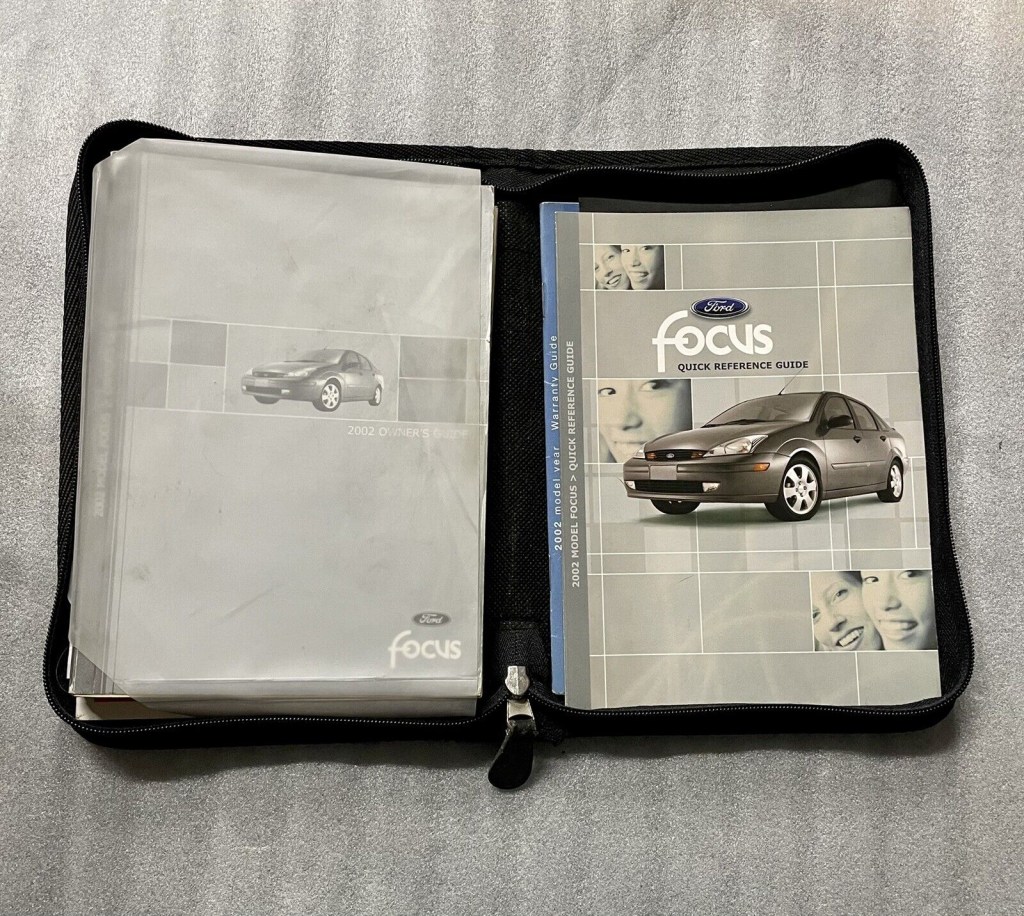 Picture of: FORD FOCUS OWNERS MANUAL GUIDE BOOK SET WITH BLACK CASE WITH CD OEM