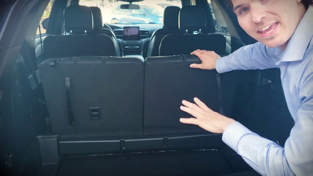 Picture of: How to fold down the rear seats in the  Ford Explorer XLT  Ford  Explorer SUV