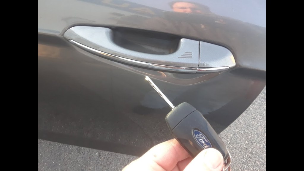 Picture of: How to Unlock a Ford Fusion Using Hidden Key Cylinder With Dead Battery
