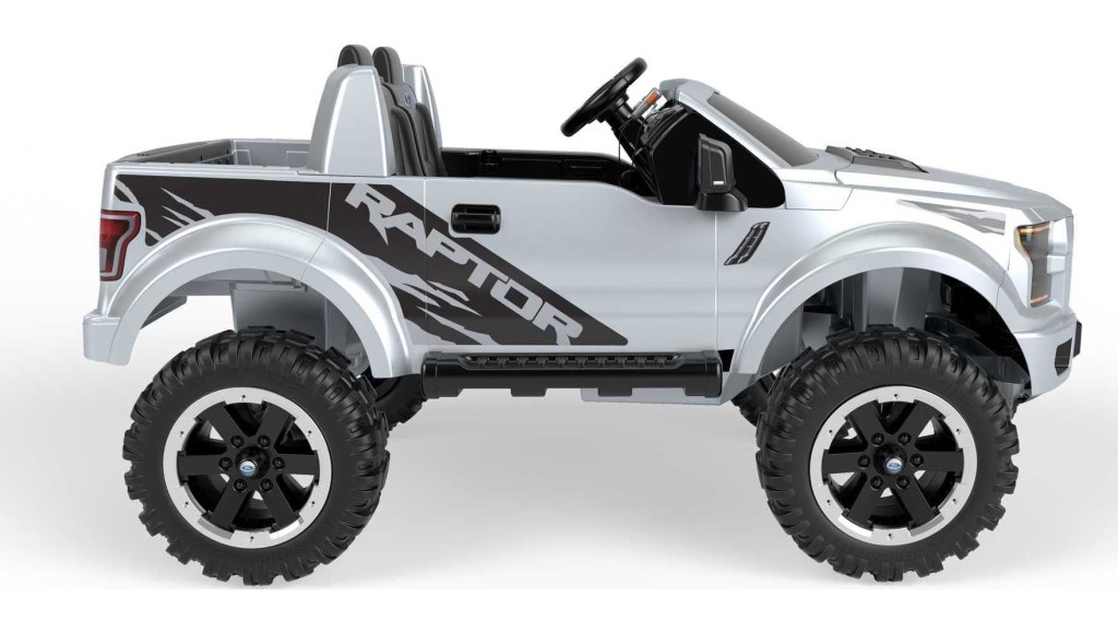 Picture of: Power Wheels Ford F Raptor Battery-Powered Ride-On Vehicle with Music  Sounds & Microphone